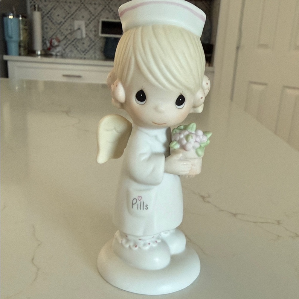 Precious Moments Angel Of Mercy